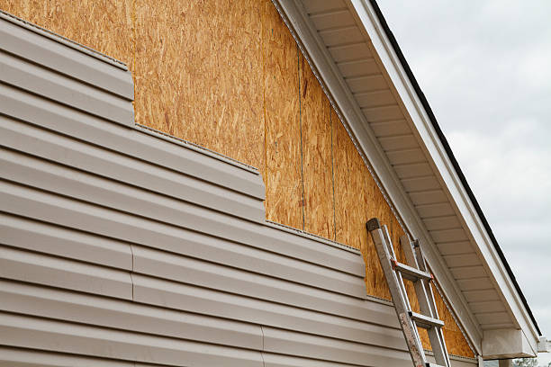 Professional Siding Contractor technician working in Covington, OH